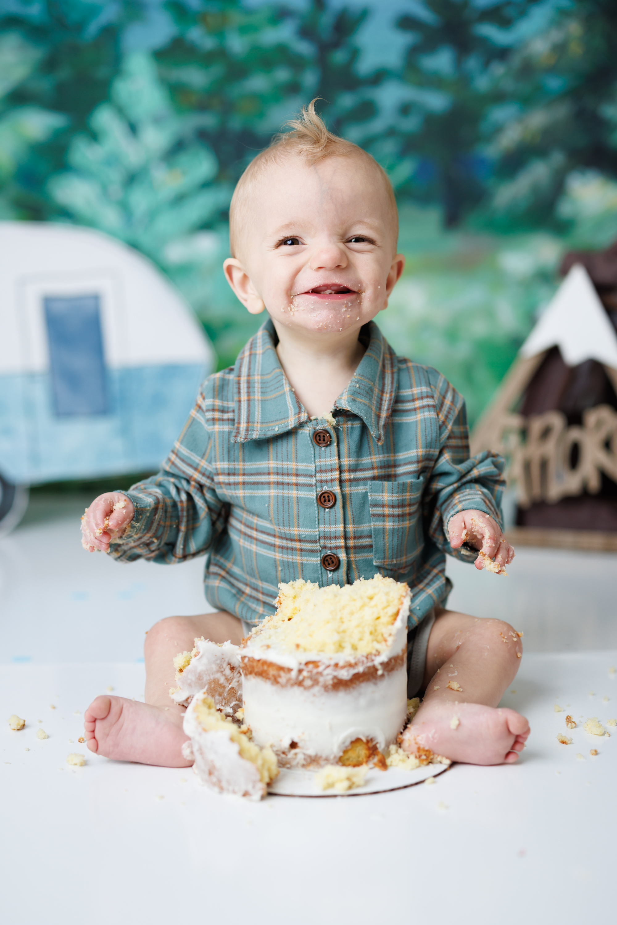 boy smiling first birthday pictures 